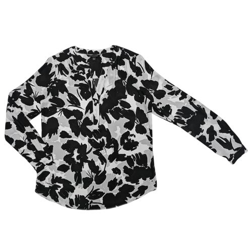 Blusa bicolor estampada floral