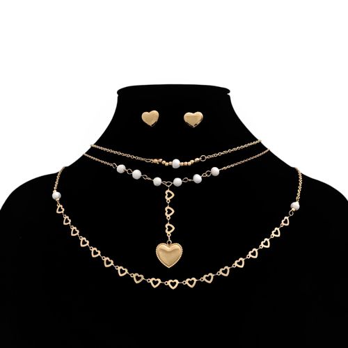 Set de collares y aritos dorados