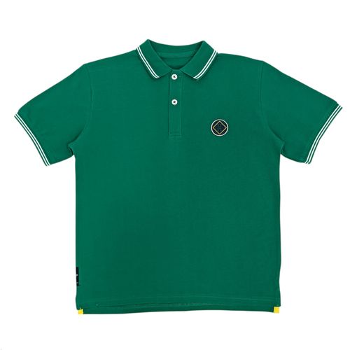 Camisa tipo polo verde sólida para niño