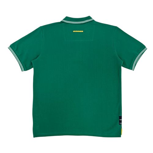 Camisa tipo polo verde sólida para niño
