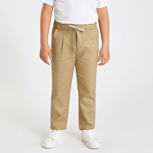 Jogger beige sólido para niño