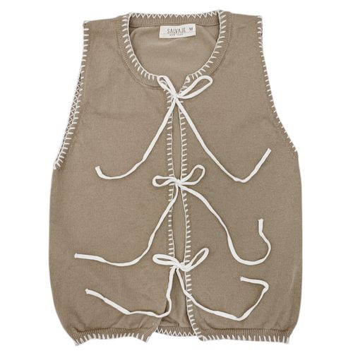 Chaleco en color beige con detalle de lazas para  mujer