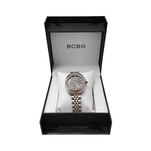 Reloj análogo bicolor con detalles para mujer