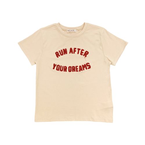 Camiseta color beige con cuello redondo para niña