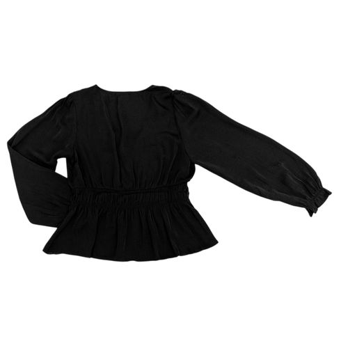 Blusa peplum color negro casual de mangas largas para mujer