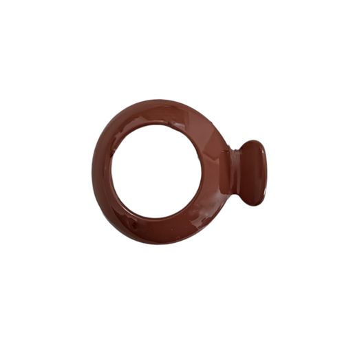Gancho para cabello color terracota con diseño circular para mujer