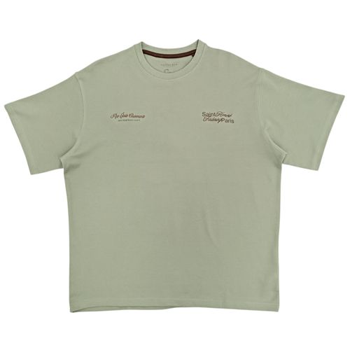 Camiseta oversize color verde claro de cuello redondo con diseño estampado para hombre